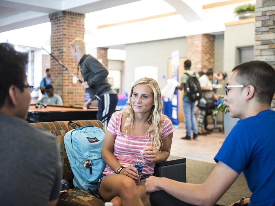 Students enjoying some downtime at student housing.